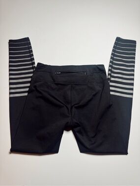 Athleta Black leggings with stripes down the leg